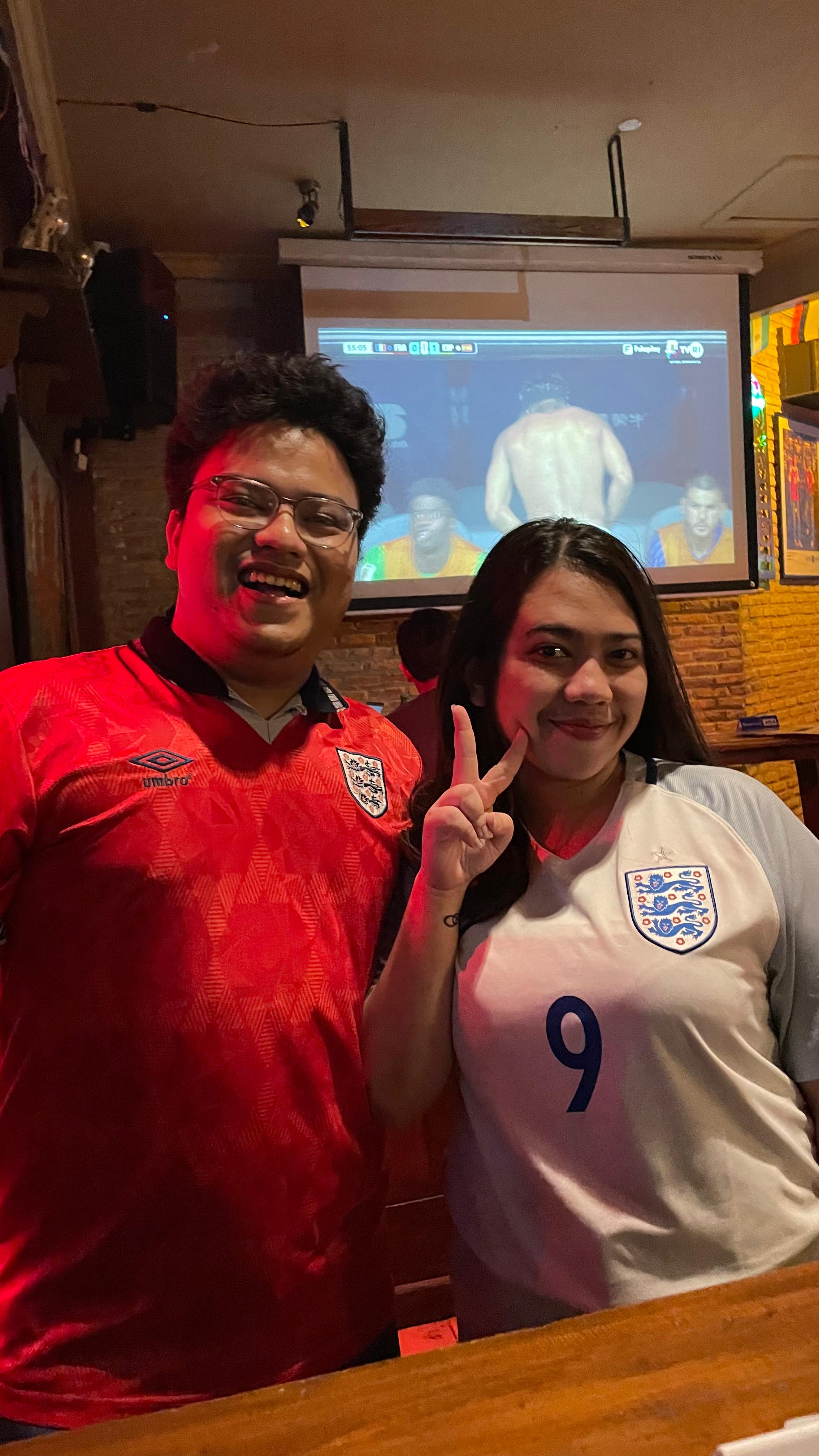 Me and my wife wearing our England shirts